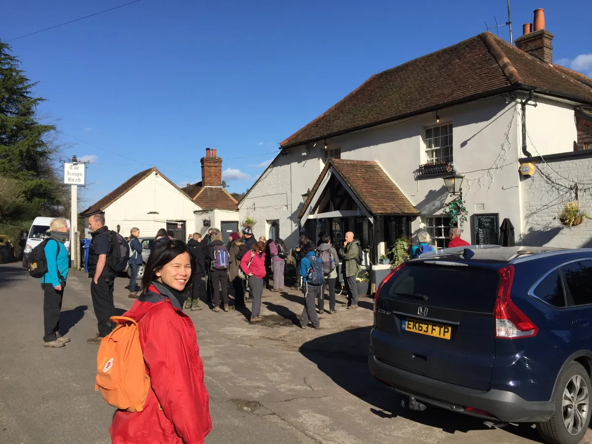 Wendy in front of a pub